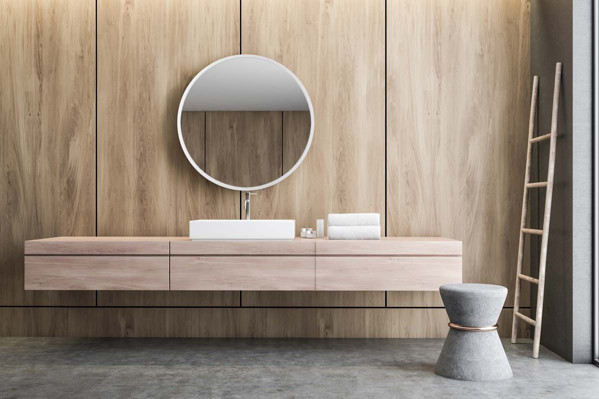 Okrągłe lustro łazienkowe w białej ramie Scandi w nowoczesnej łazience. GieraDesign
